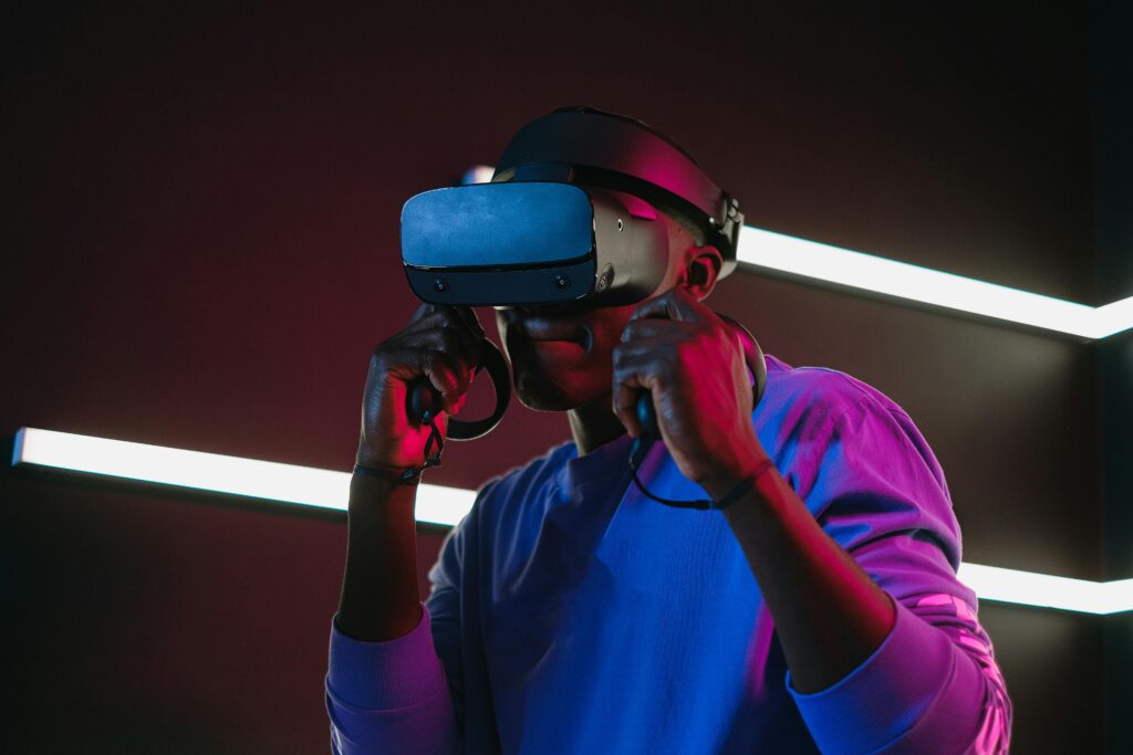 Man Playing on a Game with VR Headset